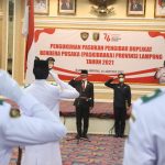 Sekdaprov Fahrizal Kukuhkan Pasukan Pengibar Duplikat Bendera Pusaka Provinsi Lampung