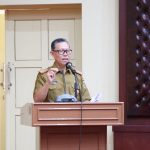 Sekdaprov Lampung Fahrizal Darminto saat membuka kegiatan Audiensi dalam rangka Percepatan Penerapan Sistem Merit dan Klarifikasi Hasil Penilaian Penerapan Sistem Merit Bagi Instansi Pemerintah di Provinsi Lampung || Foto: Adpim Pemprov Lampung