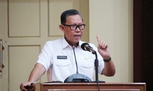 Sekdaprov Lampung Buka Seminar Netralitas dan Profesionalisme ASN Menghadapi Pemilu 2024