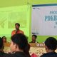 Ramadhon Zarkasyi selaku Team Leader PDKB Tanjung Karang menyampaikan materi seputar Proses Bisnis PLN kepada siswa/i SMKN 2 Kotabumi || Foto: PLN UID Lampung