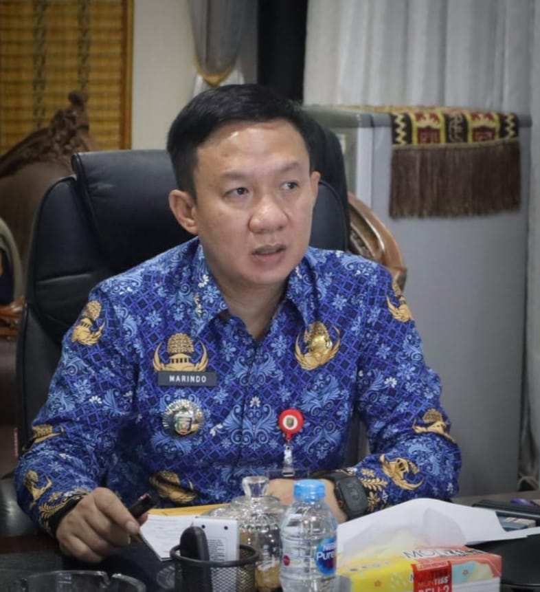 Sekdaprov Lampung, Marindo Kurniawan, memimpin rapat  percepatan penerapan sistem merit di Ruang Kerjanya || Foto: Dinas Kominfotik Provinsi Lampung