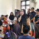 Walikota Eva Dwiana saat memberikan sambutan pada giat pemberian bantuan kepada warga terdampak banjir, Sabtu (7/3/2026) || Foto: Ridho/5W1HINDONESIA ID